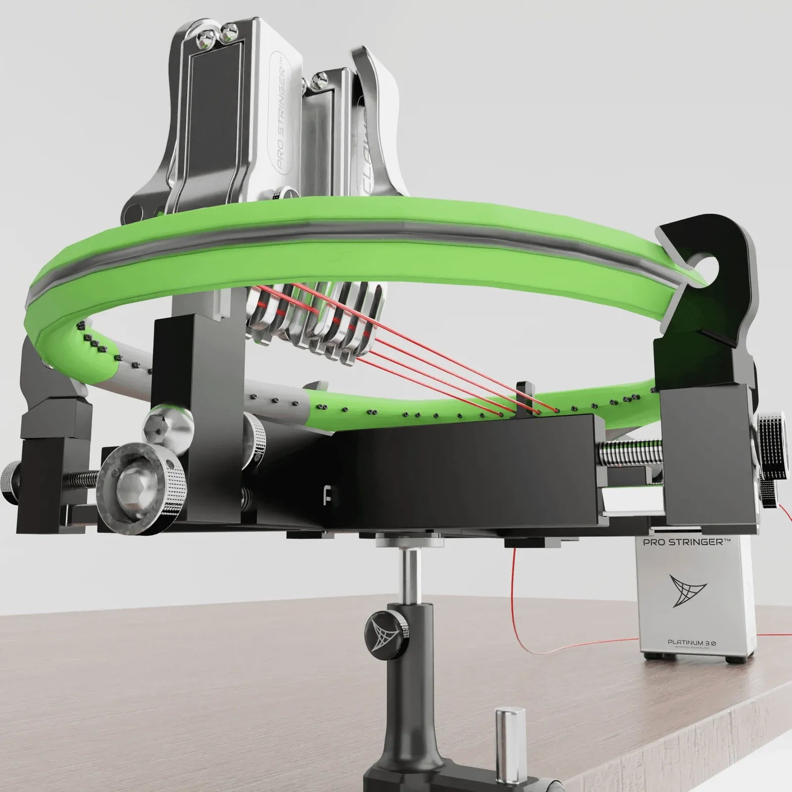 Close-up of a racquet frame held by ModuleX-6 supports and Claws clamps